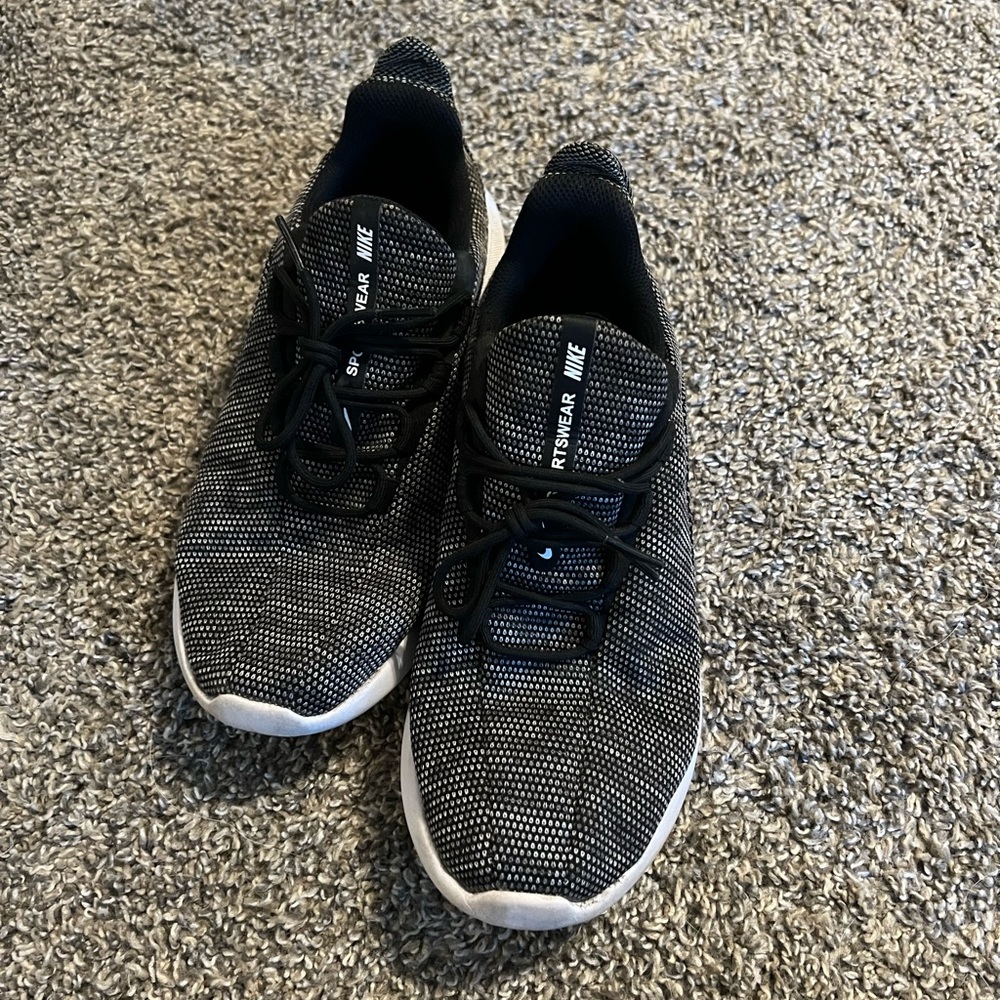 Black and white Nike running shoes